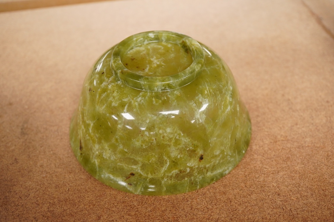 A Chinese bowenite jade bowl and a green quartz egg paperweight, 13cm